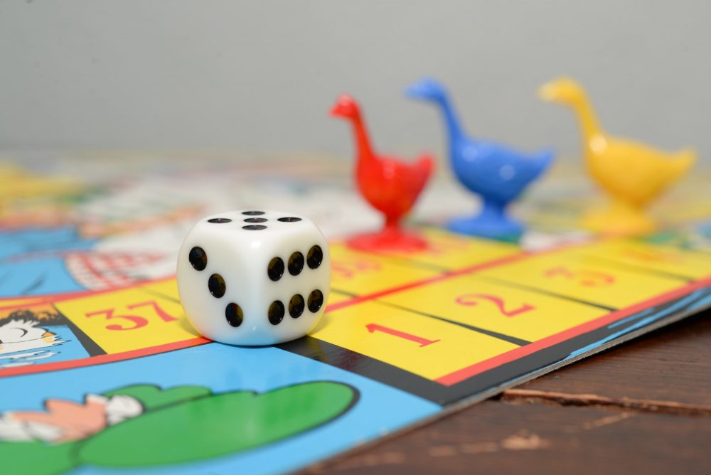 dice and toys on a basement table